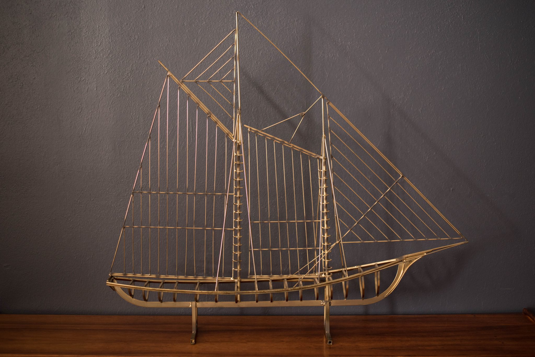 brass sailboat sculpture